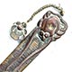  This bookmark was made in Japan. It is made of copper and brass and has an octopus on top. Two of the optopus' tentacles are outstretched and have captured it's next meal which forms the top blade. Attached to the top by a chain is a flower. The date is 1900 - 1910.  
