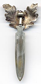 This bookmark has no hallmarks. It is finished in a gold wash which can still be seen. It is probably Austrian from the turn of last century.