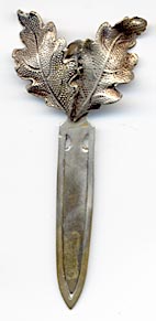 This bookmark has no hallmarks. It is finished in a gold wash which can still be seen. It is probably Austrian from the turn of last century.