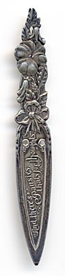 This bookmark is manufactured by the Alvin Corp. It has one of the Alvin hallmarks and is also marked Sterling on the back. The front inscription reads 'And there''s pansies, thats for thoughts.'" This is a quote from Hamlet (Act IV, Scene V). "
