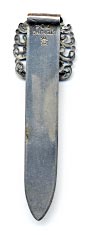 This bookmark is made in the US by H.H. Curtis & Co. between 1891 and 1915. It is marked with the makers mark, Sterling and 704. The top is an art nouveau design.
