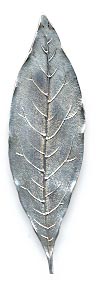 This bookmark was made in the US by Tiffany and Co. It was made in the 1960's. It is in the shape of a leaf. The hallmark on the back includes the word Maker implying that Tiffany made this one as opposed to having it made from another silversmith.