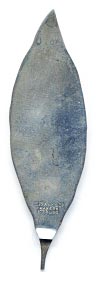 This bookmark was made in the US by Tiffany and Co. It was made in the 1960's. It is in the shape of a leaf. The hallmark on the back includes the word Maker implying that Tiffany made this one as opposed to having it made from another silversmith.