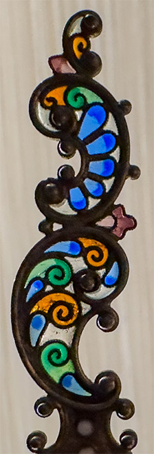 This bookmark is from Oslo, Norway by Norsk Filigransfabrikk. It is marked with a makers hallmark and stamped 925. It is finished in a gold wash and has a translucent stained glass like design at the top called plique-a-jour. The dealer said it was made circa 1890 - 1900.