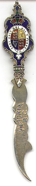 This bookmark is Canadian made circa 1920 - 1930. On the blade is written Victoria BC. At the top there is a crest made of enamel. The inscription, "Honi Soit Qui Mal Y Pense" means 'evil to him who evil thinks' in old Norman French. It is finished in a gold wash and is marked with a hallmark and the word Sterling.