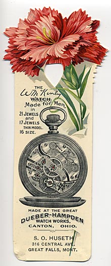 This bookmark is made in the US as an advertisment for the Dueber-Hampden Watch Works company for pocket watches. It was made between 1910 - 1930 of celluloid by the Whitehead & Hoag Co., Newark, NJ. There is printing on the front and the back. The front advertises a men's watch and the back is for a woman's.