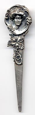 This is an art nouveau bookmark made sometime between 1904 and 1914. The manufacturer is F.S. Gilbert, a small maker of silverware in North Attleboro, Massachusetts. The bookmark is marked Sterling G.