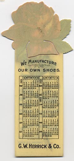 This bookmark was made in the US by Whitehead & Hoag of Newark, NJ. It is an advertising bookmark for the G. W. Herrick & Co. women's shoes. The flower on top is a rose with its bottom petal cutout for the second blade. On the back is a calendar for May 1901 to April 1902. It also says "We manufacture our own shoes." The date is 1901.