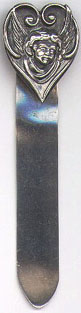 This bookmark is only marked Sterling. It looks like it is an angel within a heart. Date unknown.