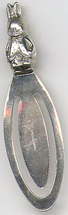 This bookmark English made. It has a manufacturers mark of AN and a date mark of V. It is also marked 925. It is from 1995.