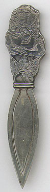 This bookmark is American made but is only marked Sterling. I believe that only the top part is silver. It is made by Webster Co. between 1900 and 1920. This was sold as a letter opener by Webster.