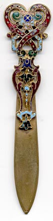  This bookmark was made in France between 1890 and 1900. It is a very decorative brass and Champleve enamel piece.  