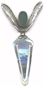 This bookmark is hand made by an unknown artist. I haven't got a clue what it's shape is. It has a semi-precious green stone in the middle. It's stamped 925 on the back.