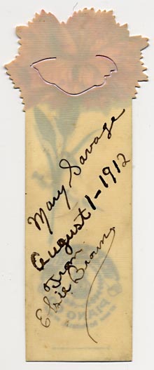  This bookmark was made in the US by the Whitehead and Hoag Co. of Newark NJ. It is a celluloid advertising bookmark with acarnation flower on top and advertising Jones Piano Co in Des Moines, Iowa. The back dates this piece at August 1, 1912 as a gift.  