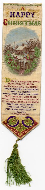 This bookmark was made in Coventry, England by Thomas Stevens. It is known as a Stevengraph and is made of woven silk on a Jacquard loom. This one is "A Happy Christmas" and has a poem and a winter scene.