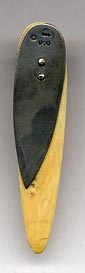 This bookmark was made in France. It is marked with French hallmarks and 800 for 800 fine silver. The top blade is ivory and the bottom which is behind the top is silver. On top of the ivory blade is a three dimensional figural of a goat head. The date is 1900 - 1910.   