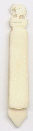 This bookmark is made of bone. What kind of bone I don't know. I have 2 of these and the only reason I bought them was because I was told they were old and made of ivory. You can't win them all.