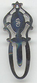 This bookmark is American from Webster Co. It is marked Webster Sterling with the manufacturers hallmark. Date is probably 1920 - 1930s.