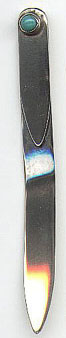 This bookmark is Mexican. It is marked Silver Mexico. It has a small turquoise piece at the top. Date is unknown.