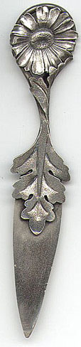 This is an American made bookmark manufactured by Gorham. It is marked with the manufacturers hallmark, Sterling and the number 50. It large and heavy for a bookmark and has the picture of a Chrysanthemum with it's leaf. It's nicely detailed and is one of 33 different bookmarks from the Autumn 1888 Gorham Catalog. 