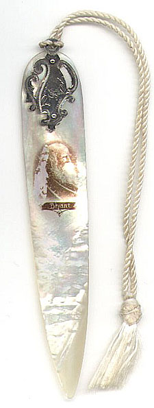 This is an American made bookmark. It is made of Sterling and Mother of Pearl. It has the picture (it looks like a photo) of Willian Bryant (1794-1878), the poet and journalist. It is marked Sterling.