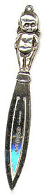 This bookmark was made in Birmingham England. It is marked W.H.C. BCM/PRIAUR. The date mark is H indicating is was made in 1932. It is a kewpie doll on the top of the bookmark.