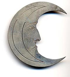  This bookmark was made in London, England. It is marked with HSB, the manufacturer, the hallmarks for London and the year 1889, and Houghton & Gunn 162 New Bond St. W. It is a figural Man in the Moon with a face on both sides.   