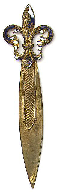 This bookmark is made of brass and has some enamel left on the top part. Date is unknown. It's probably French made.