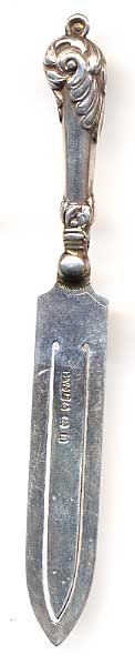 This bookmark was made in England by HW Ltd. It is a figural sword or knife and has hallmarks for Birmingham. The date is 1912.