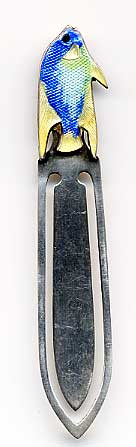 This bookmark was made in the US by H-RCo. It is marked H-RCO Sterling on the back. The top is a blue, green and yellow enamel paradise fish. The date is 1900 - 1910.