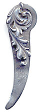 This bookmark is made by Gorham and is marked with the manufacturers hallmark and the number 71. It is an interesting shape with the top blade swirling around in the shape of a leaf.
