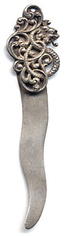 This bookmark depicts a snake entwined in a viney flowery design. It is made of silver and is marked sterling on the back. 