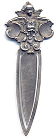 This bookmark was made in the US by William Kerr. It has  his famous hallmark on the back. The to is an angel or cherub.