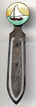 This bookmark is completely unmarked but is so similar to other pieces that I have, I know it to be sterling. The top in an enamel sail boat. The date is 1911 - 1920.