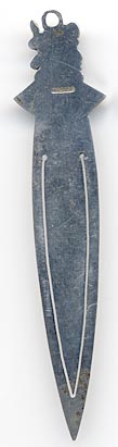 This bookmark was made in Spain and is marked Maside, which according to Wikipedia, is a municipality in Ourense (province) in the Galicia region of north-west Spain. The top is the head of a conquistador. The date is unknown.