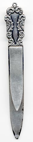 This bookmark was made in the US by S. Cottle Co. It has the makers hallmark and the word sterling on the back. The top has some scrollwork.  .