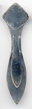 This sterling bookmark was made in Birmingham England in 1921 by G W Lewis as indicated by the hallmarks. The top has a glass enclosed piece of a butterfly wing in iridescent blue. It is still quite vibrant after 95+ years.
