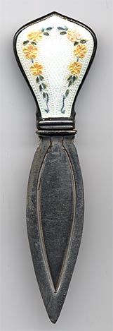 This bookmark is American made by Webster Company sometime between 1890 - 1915. The top of the bookmark is enamel with orange  flowers. It is marked Sterling with the Webster hallmark. It was sold as a letter opener by Webster.