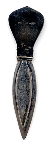 This bookmark is American made by Webster Company sometime between 1890 - 1915. The top of the bookmark is enamel with orange  flowers. It is marked Sterling with the Webster hallmark. It was sold as a letter opener by Webster.
