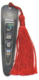 This bookmark was made in London, England and is marked with the standard London marks. The date mark is the letter R indicating 1991. It has the letters DJ above the standard marks.