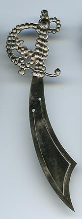This bookmark was made made at Halifax in Yorkshire, England. It is in the shape of a sword with a fancy hilt. the date is 1898.