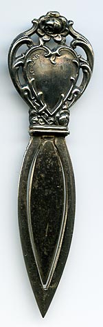 This bookmark was made in the US by Webster Co. It is marked Sterling and the makers hallmark. It was made in 1913 and was originally sold as a letter opener.