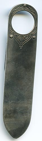 This bookmark was made in Chester, England in 1894 by Cornelius Saunders &amp; Francis Shepard. It probably had a magnifying glass at one time. This is almost identical to bookmark 1094 except for the material.