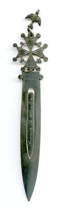 This bookmark was made in Europe, possibly France. It is marked JR and 800 for coin silver. The top has a cross with a figural bird attached to the top. The center blade is inscribed Souvenir de Marlise and the back is inscribed 14.V.41. 