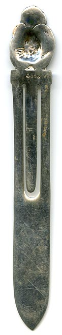 This bookmark was made in a South American country. It is marked with an anchor hallmark and 900. The top is in the shape of a flower.