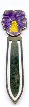 This bookmark was made in the US by F.A. Hermann Co. It is marked sterling and has half of a hallmark on the top back. The top is an enamel pansy flower in purple and yellow. 