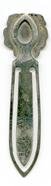 This bookmark was made in the US by F.A. Hermann Co. It is marked sterling and has half of a hallmark on the top back. The top is an enamel pansy flower in purple and yellow. 