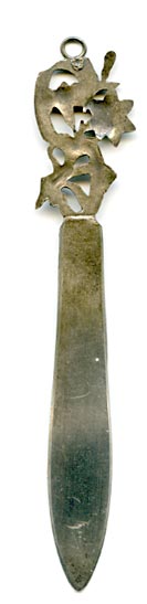 This bookmark was made in France at or around the turn of the 20th century. It is either marked with a french hallmark or it is unmarked and this is excess solder. You decide. The top is an art nouveau design of flowers.