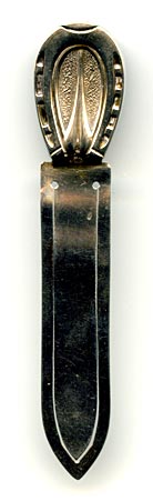 This bookmark was made in England. The date is 1887  and the manufacturer is David and Lionel Spiers from the mark. The top is in the shape of a horseshoe.