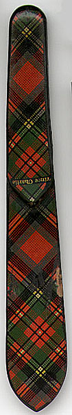 This bookmark is made of wood in Scotland anywhere from 1880 - 1920. It is Tartanware with the Prince Charlie label. It is in the shape of a men's tie.